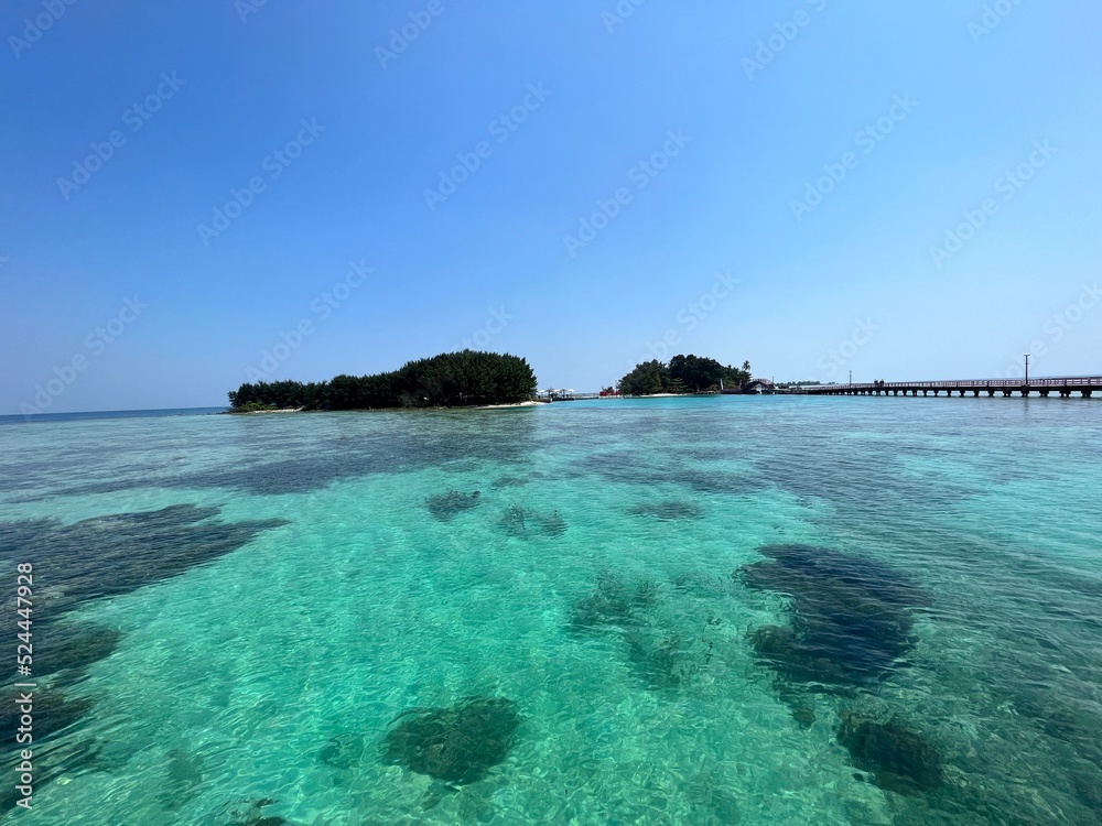 Fototapeta premium Seafront at Daylight on Pulau Tidung, one of the Thousand Islands close to Jakarta, Indonesia