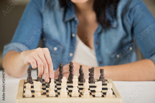 woman playing chess