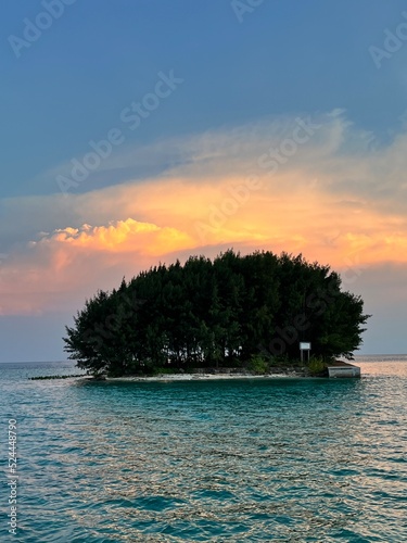 August sunset over the sea at Pulau Tidung, one of the Thousand Islands close to Jakarta, Indonesia