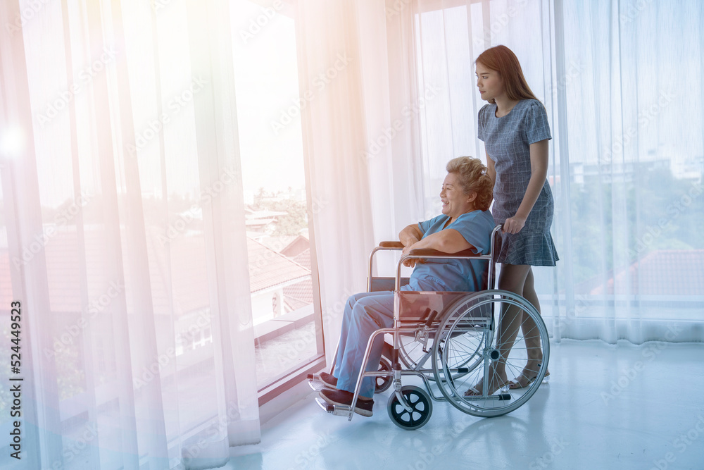 asian female take care mother at hospital asian female take care mother at hospital