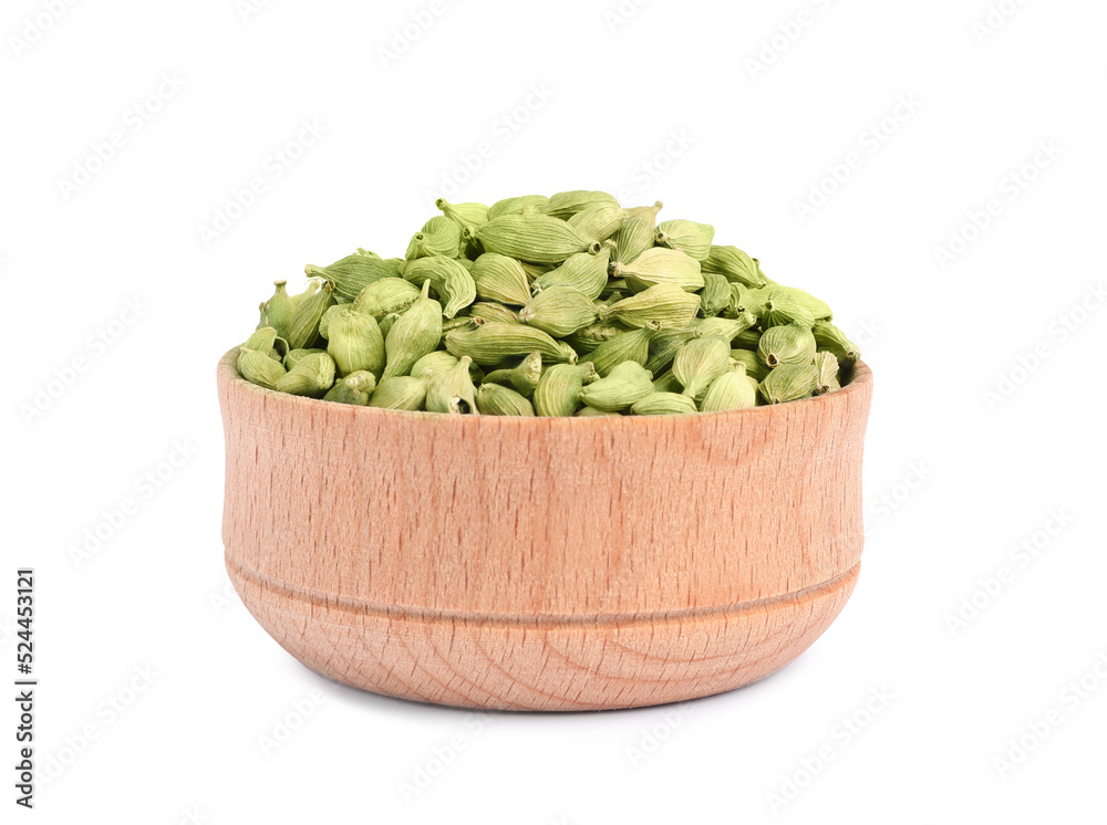 Wooden bowl with dry cardamom seeds isolated on white Wooden bowl with dry cardamom seeds isolated on white