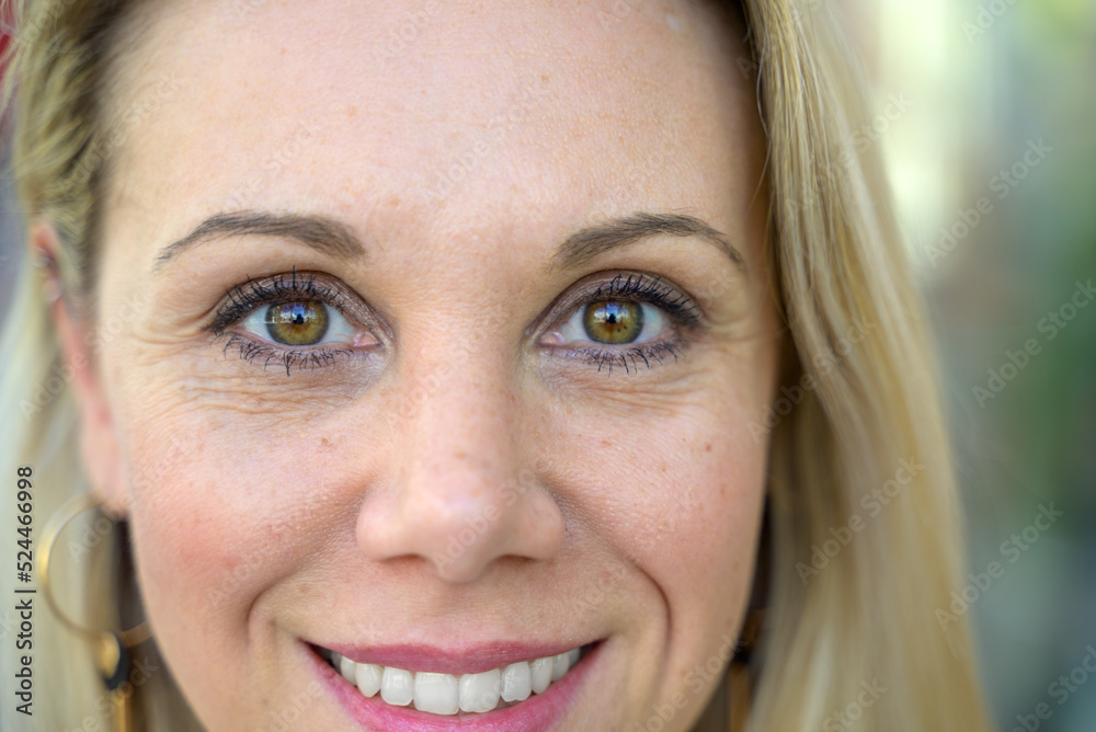 Cropped close up portrait of the face of an attractive woman Cropped close up portrait of the face of an attractive woman