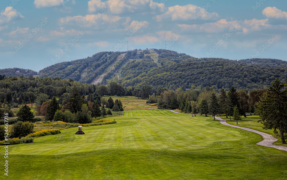 Golf Chateau Bromont Hole #18 on a beautiful summer day at the foot of Mont Bromont 