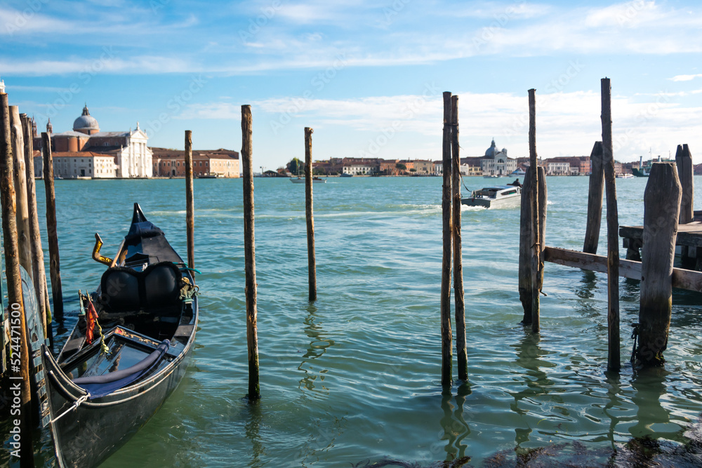 View of the Grand Canal and a solitaire gondola at Venice, Veneto, Italy