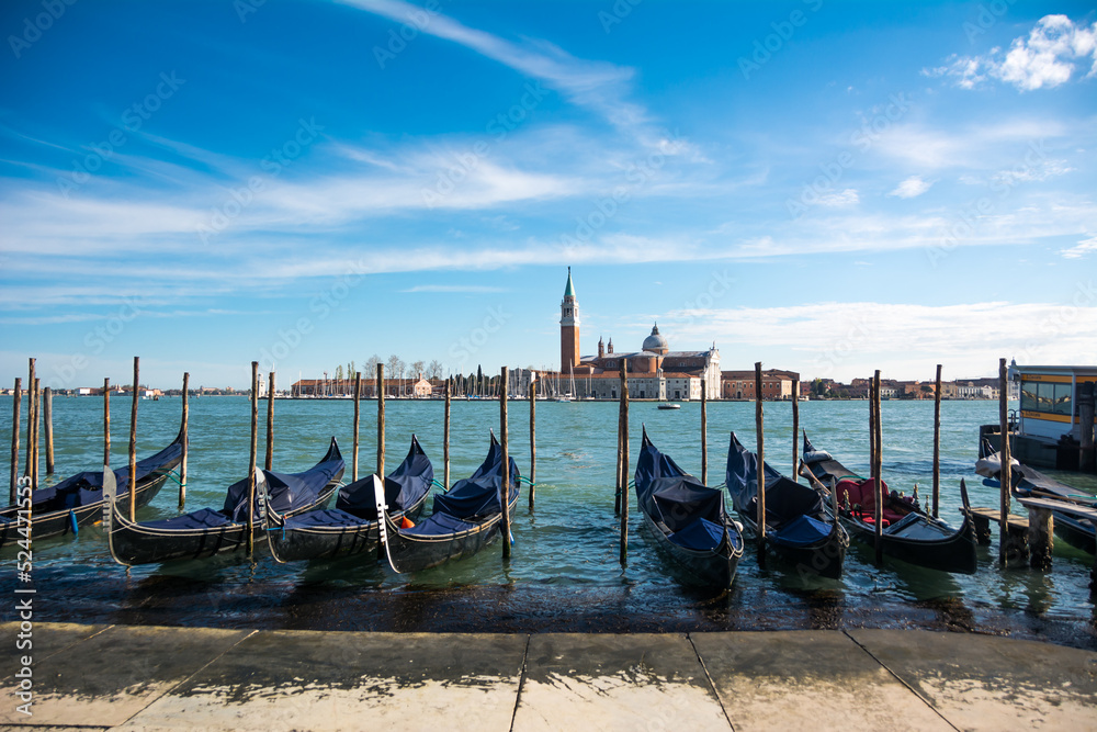 View of the Grand Canal and gondolas and San Giorgio Maggiore Church at Venice, Veneto, Italy.
