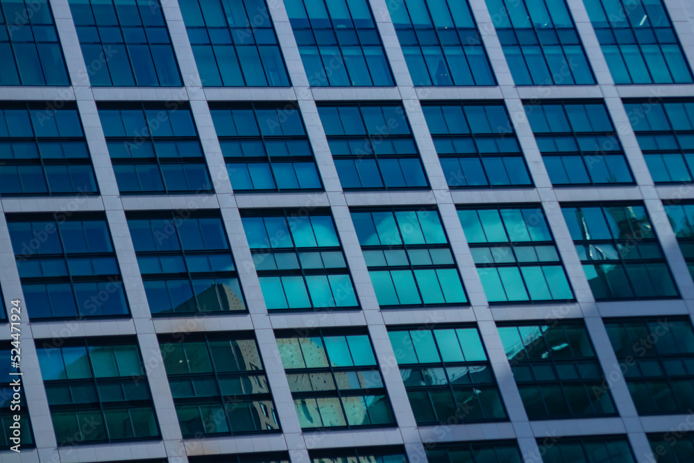 A cloud reflecting the building in the business town long shot