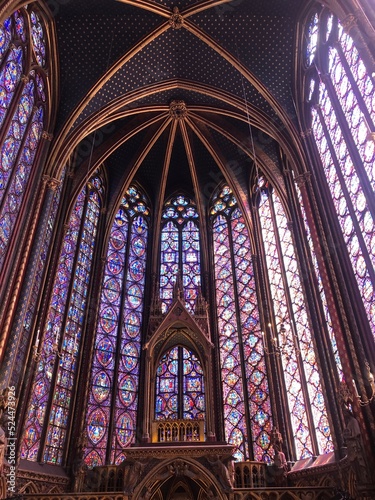 Incredible stained glass windows and altar Inside Sainte-Chapelle on a sunny day, 2022, Paris, France. Best Paris sightseeings and tourist attractions
