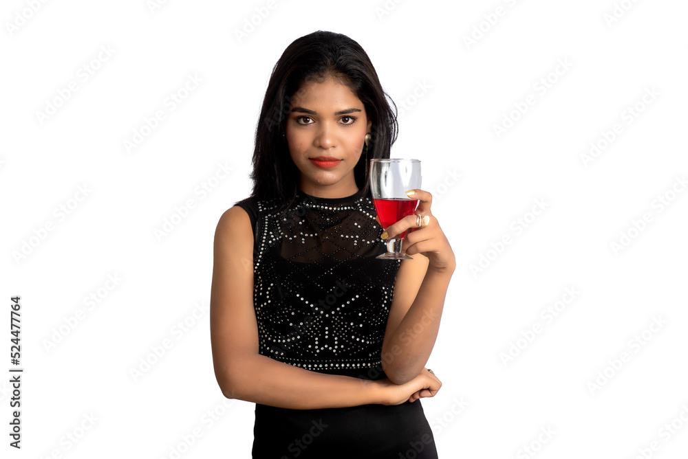 Portrait of a cheerful young woman holding a glass of wine isolated over white background Portrait of a cheerful young woman holding a glass of wine isolated over white background