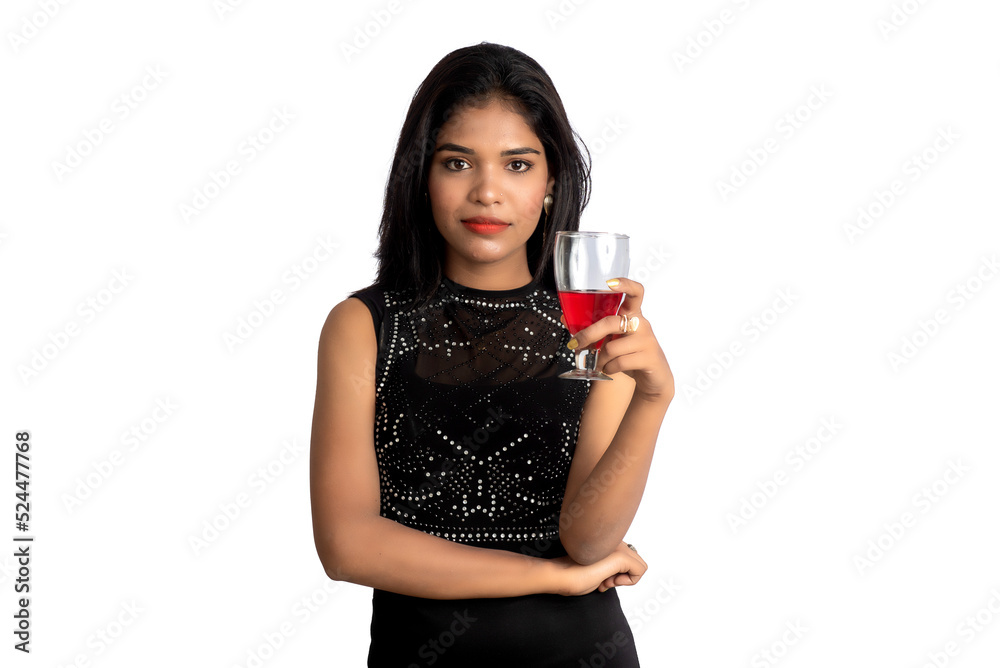 Portrait of a cheerful young woman holding a glass of wine isolated over white background Portrait of a cheerful young woman holding a glass of wine isolated over white background