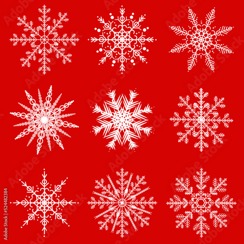 White snowflakes on the red background. Seamless pattern.