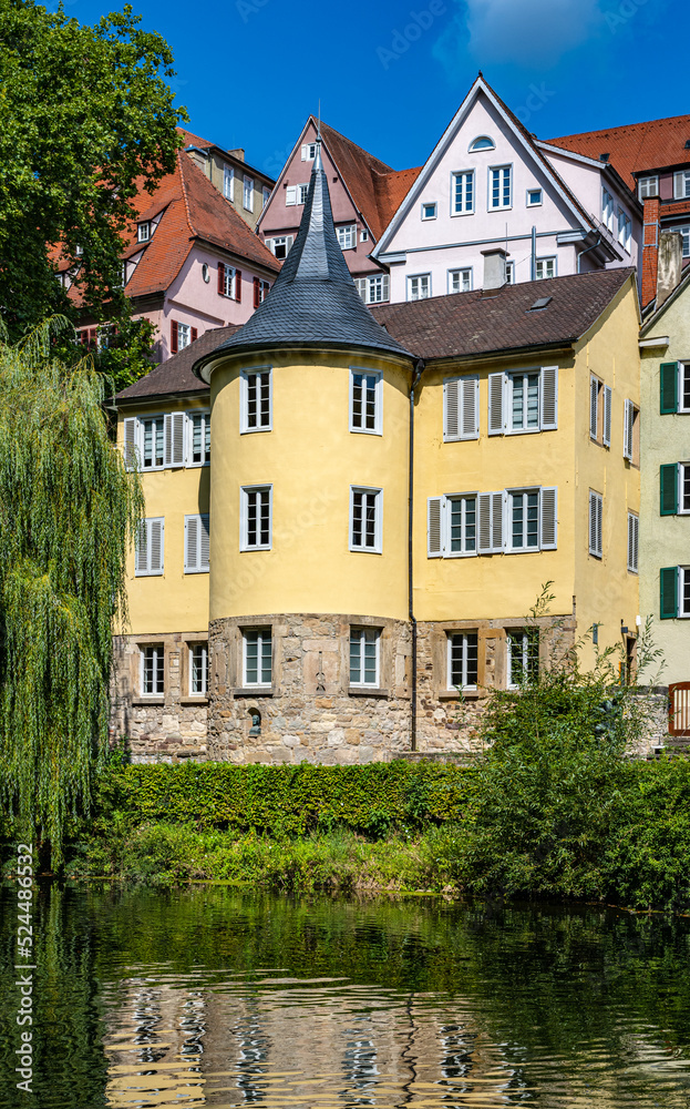 The Hölderlin Tower on the historic old town bank of the Neckar River in Tübingen. Baden-Württemberg, Germany, Europe