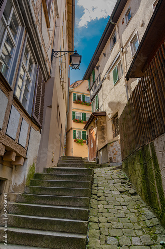 Tübingen old town. Narrow streets lead up to Hohentübingen Castle. Baden Wuerttemberg, Germany, Europe