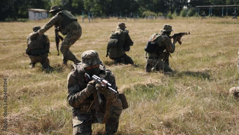The Military Special Forces Unit is on the battlefield, armed with ammunition and weapons to attack the enemy.