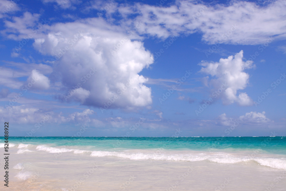 Travel background with Caribbean sea and clouds sky.