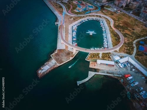 aerial view of aliaga avci ramadan park at sunset with beautiful clouds and colors photo