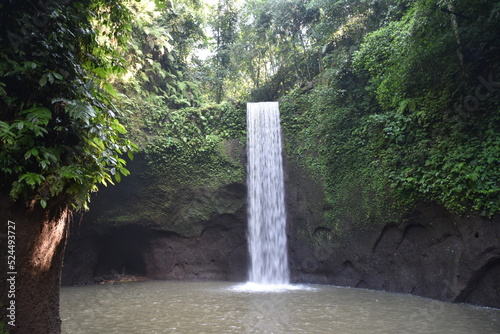 Tibumana Waterfall, Bali, Wide Shot with Cove Wrapping Around in Left Foreground