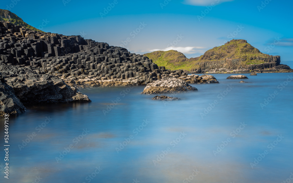 Beautiful Exposure of Giant's Causeway UNESCO World Heritage Site, is an area of about 40,000 interlocking hexagonal basalt columns, the result of an ancient volcanic fissure eruption. It is located i