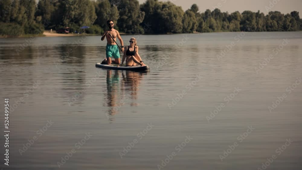 Stand Up Paddle Recreation Fitness. Warm Summer Sport Vacation Holiday. Travel Paddles Paddleboard. Sup Board Journey. Couple Relaxing Sup Surf Swimming. Watersport Floating Surfboard Sport Recreation Stand Up Paddle Recreation Fitness. Warm Summer Sport Vacation Holiday. Travel Paddles Paddleboard. Sup Board Journey. Couple Relaxing Sup Surf Swimming. Watersport Floating Surfboard Sport Recreation