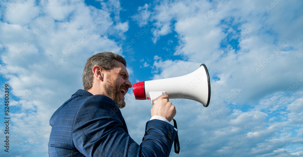 businessman shout in loud hailer on sky background businessman shout in loud hailer on sky background