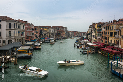 A beautiful view of the Grand Canal and boats and ancient buildings at Venice  Veneto  Italy.