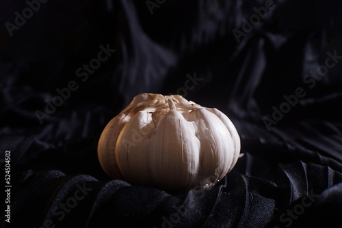 garlic on black background