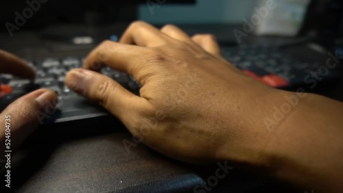 someone is typing on a computer