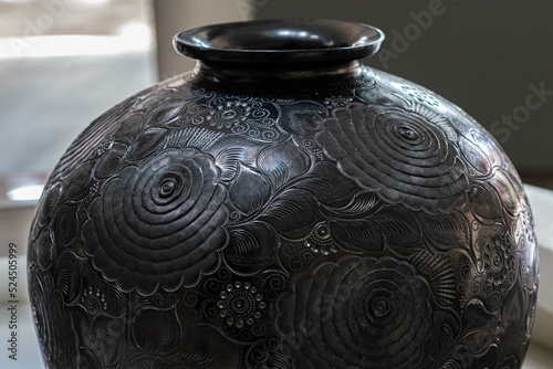 Detail of traditional black clay handcraft from San Bartolo Coyotepec, Oaxaca, Mexico