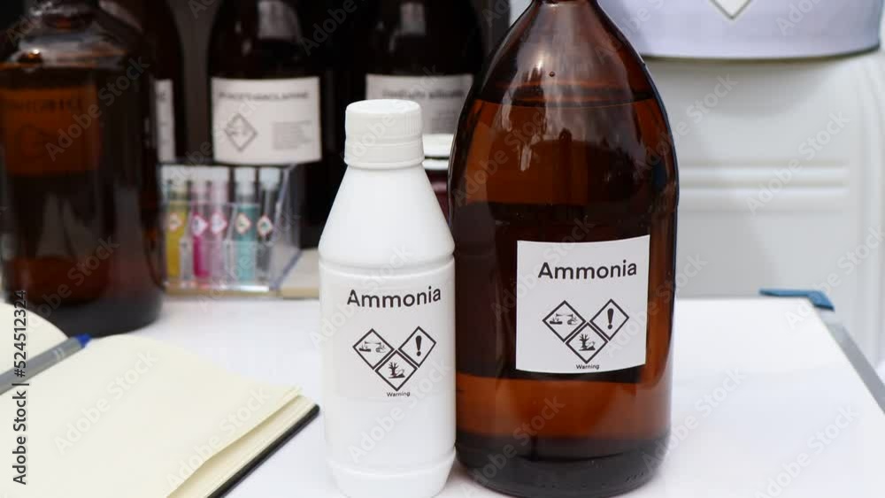 Ammonia in bottle, chemical in the laboratory and industry