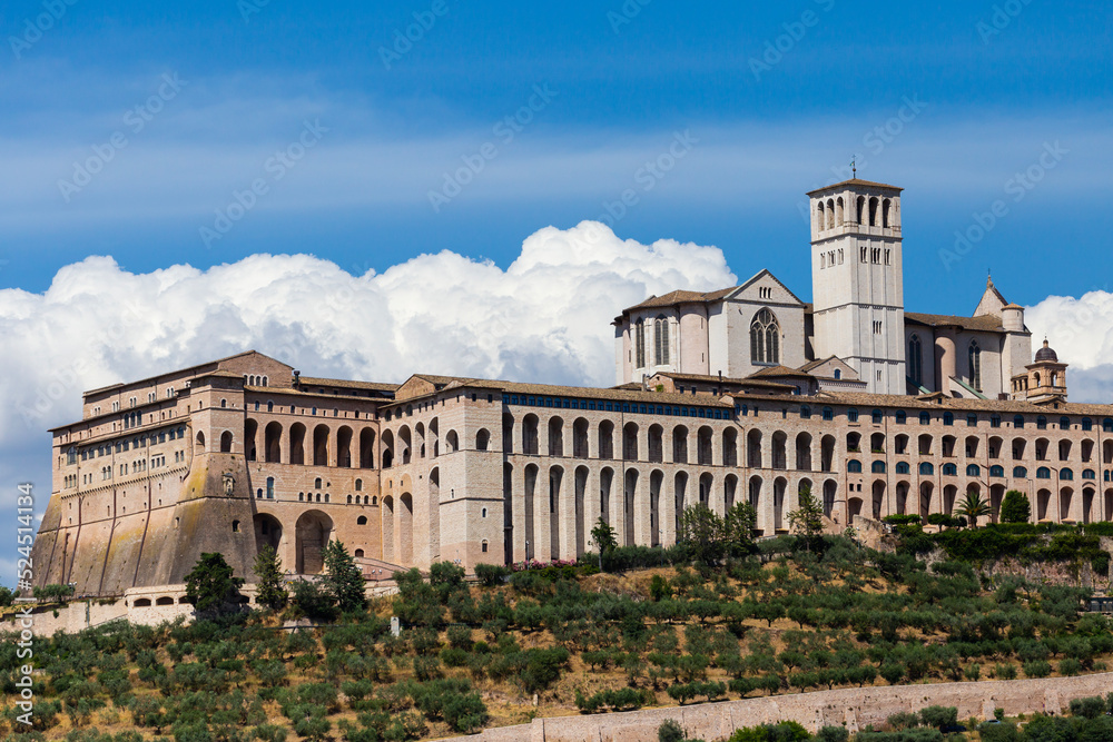 Fototapeta premium Assisi village in Umbria region, Italy. The most important Italian Basilica dedicated to St. Francis - San Francesco.