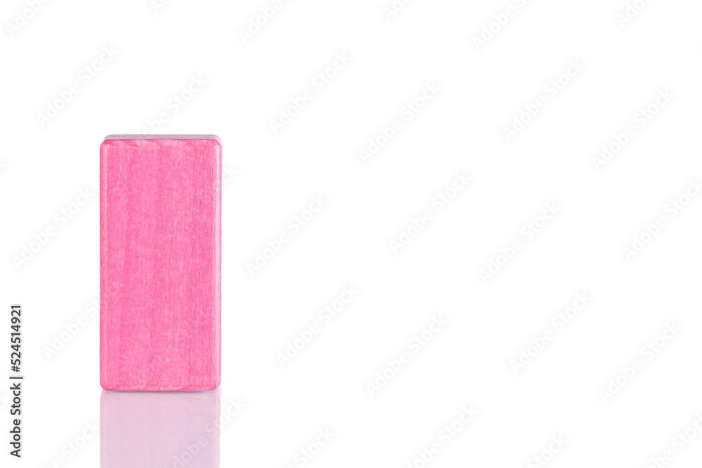 Wooden cube of pink color on a white background Wooden cube of pink color on a white background
