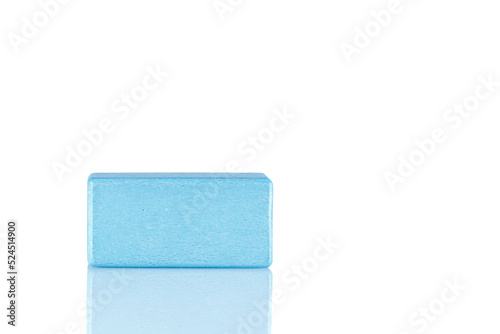 Wooden cube of blue color on a white background