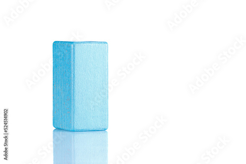 Wooden cube of blue color on a white background