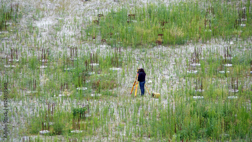 Surveyor working at a construction site
