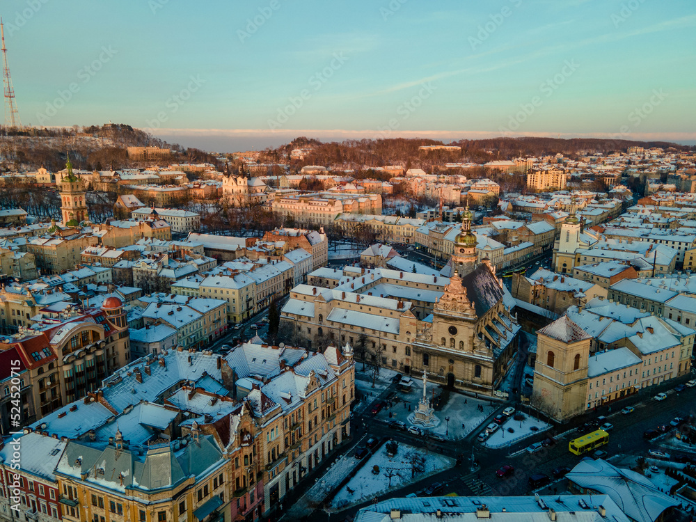 sunset above lviv city winter season