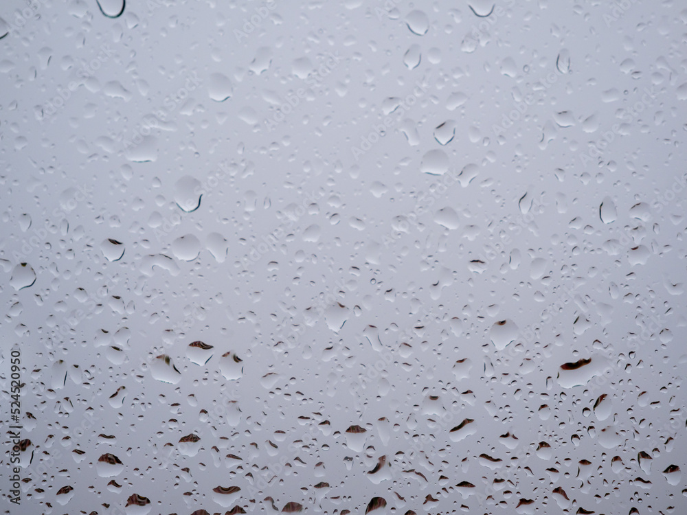 Raindrops on the window glass. Current raindrops. Raindrops on the window glass. Current raindrops.