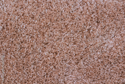 beige carpet texture,fibers on the carpet close-up background