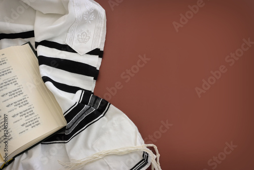 religion image of white prayer talit and book. Rosh hashanah (jewish New Year holiday), Shabbat and Yom kippur concept