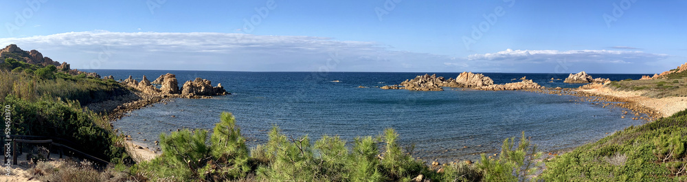 Panoramic view of Cala Rossa, a beautiful beach in Sardinia, Italy.