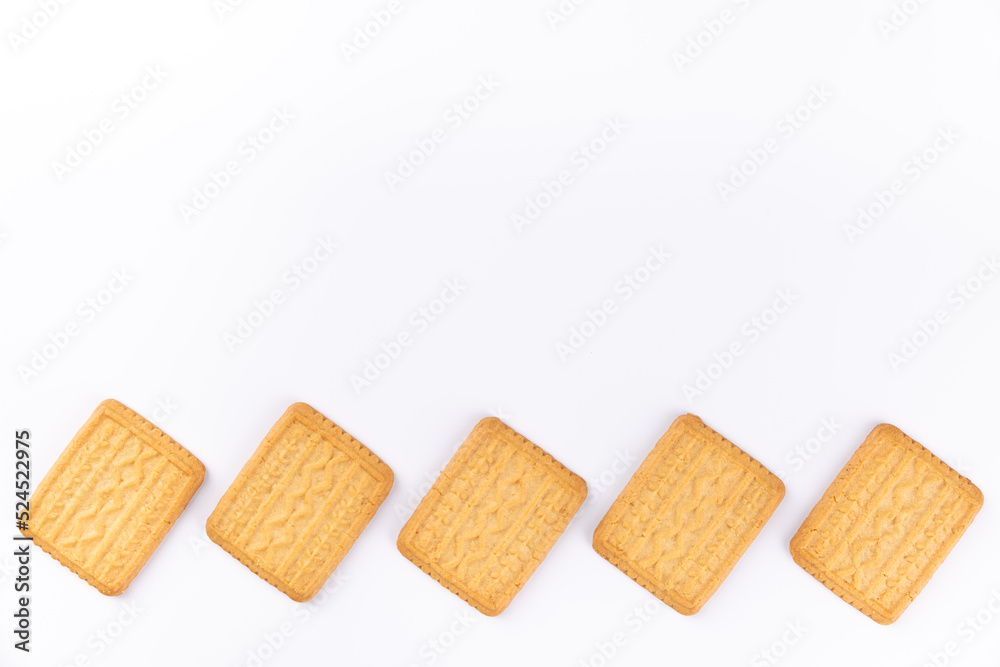 handmade wheat flour cookies in line on a white background. Copy space handmade wheat flour cookies in line on a white background. Copy space