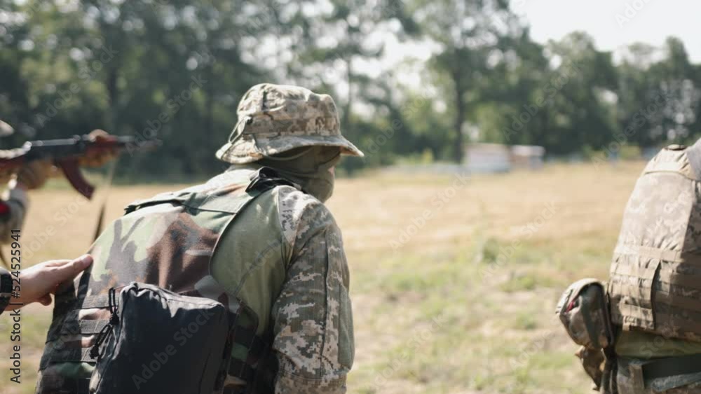 Soldiers with weapons and ammunition are attacking the enemy on the battlefield, Military Special Forces Units Soldiers with weapons and ammunition are attacking the enemy on the battlefield, Military Special Forces Units