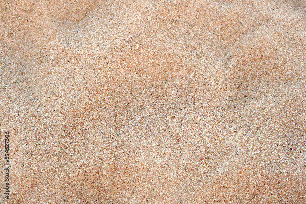 Flat view of clean yellow sand surface covering seaside beach. Sandy texture Flat view of clean yellow sand surface covering seaside beach. Sandy texture