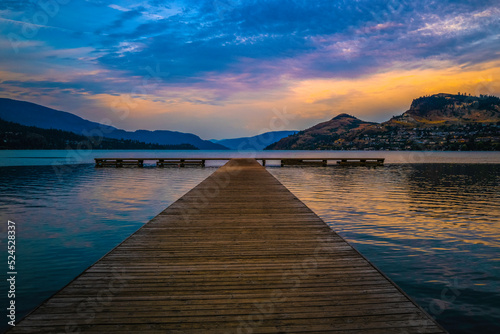 Tranquil twilight landscape over the dock at Kal Beach of Kalamalka Lake in Vernon, British Columbia, Canada photo