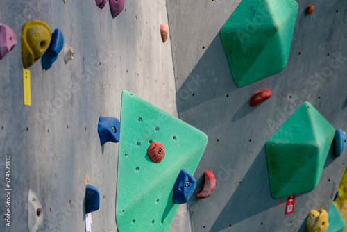 climbing stand simulator outdoors. Artificial holds for training rock climbers