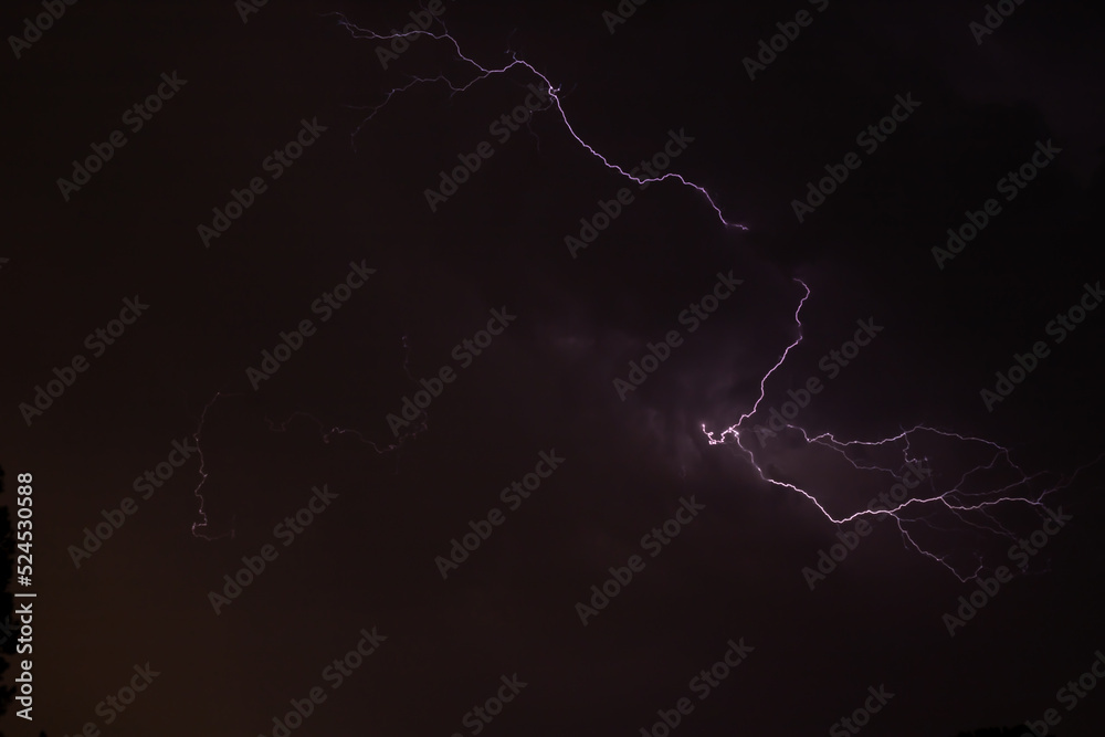 lightning storm, summer storm, lightning and thunder in purple colors lightning storm, summer storm, lightning and thunder in purple colors