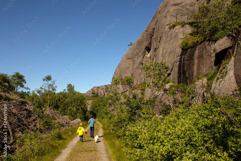 Happy people, enjoying amazing views in South Norway coastline, fjords, lakes, beautiful nature