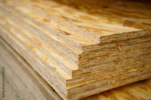 OSB board. sheet material is used in construction. hardware store.  © andrey