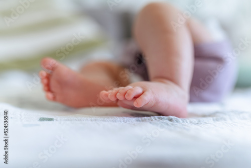 Cute baby feet on the blanket © KseniaJoyg