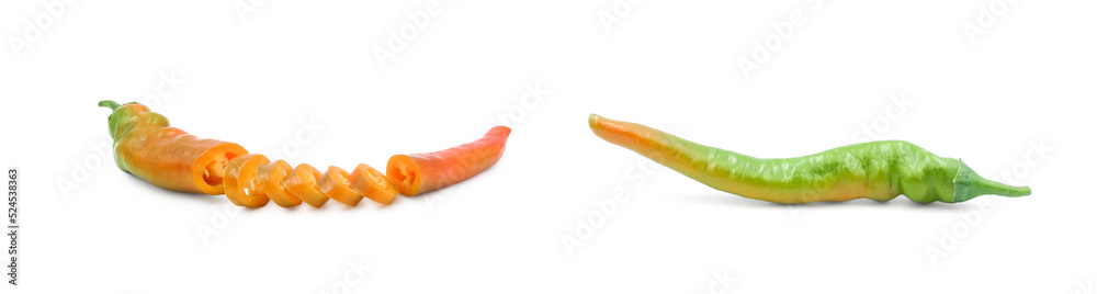 Sliced red hot chili pepper and whole green one isolated on white background side view. Seasoning for cooking. Sliced red hot chili pepper and whole green one isolated on white background side view. Seasoning for cooking.