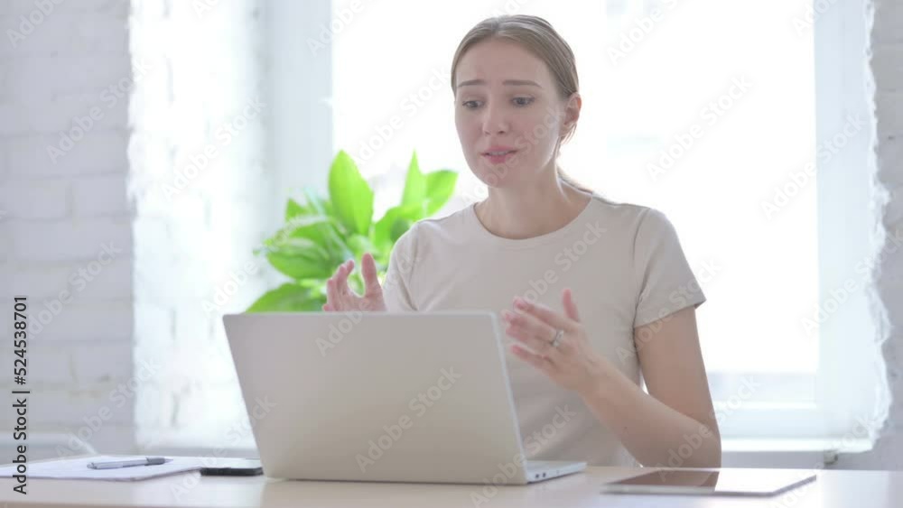 Woman Reacting to Loss While Working in Office Woman Reacting to Loss While Working in Office
