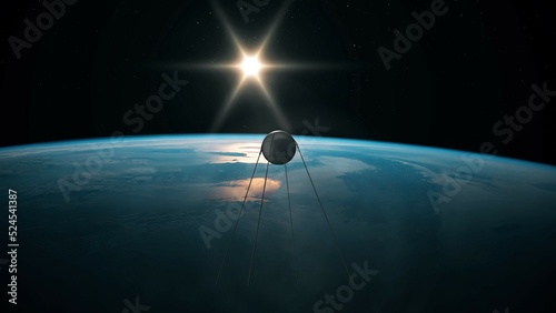 Satellite Sputnik 1 in its orbit in space with Earth below. 3D rendering of the first artificial satellite orbiting Earth.  photo